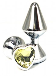 Серебристая анальная пробка с желтым кристаллом-сердцем - 8 см.